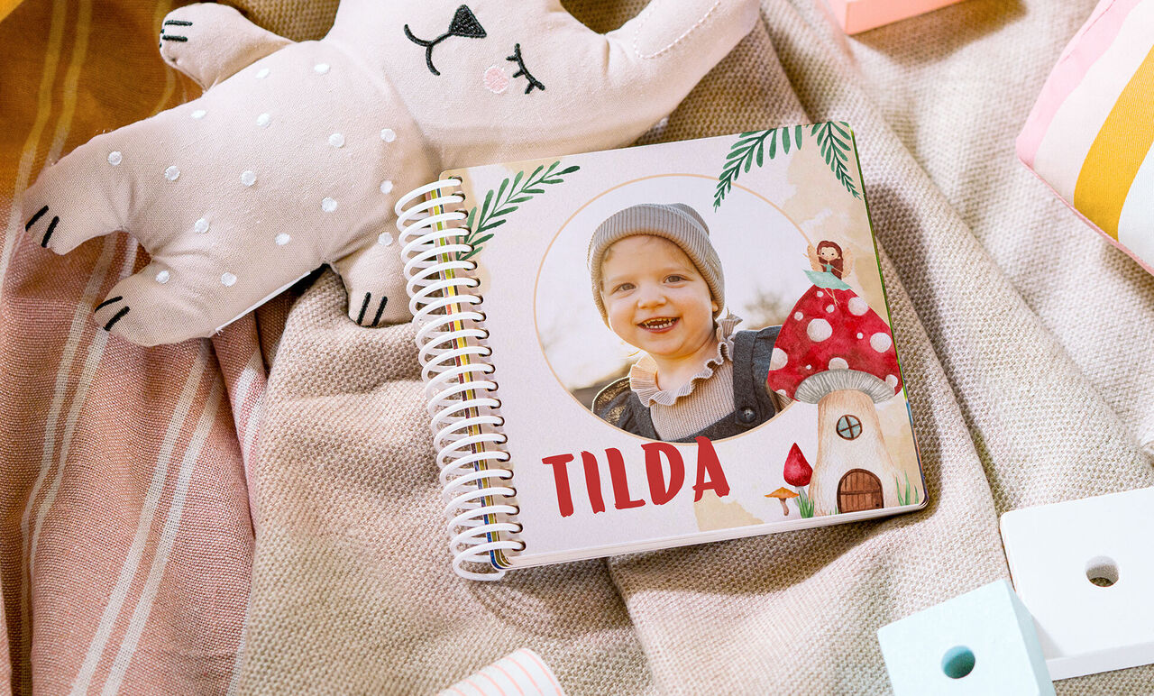 CEWE FOTOBUCH mit Spiralbindung und Kinderfoto, Name Tilda auf dem Cover