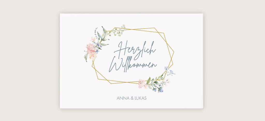 Willkommensgrußkarte mit floralen Elementen und Goldrahmen