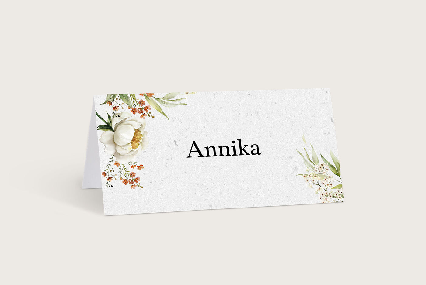 Elegante Namenskarten mit floralen Verzierungen für besondere Anlässe