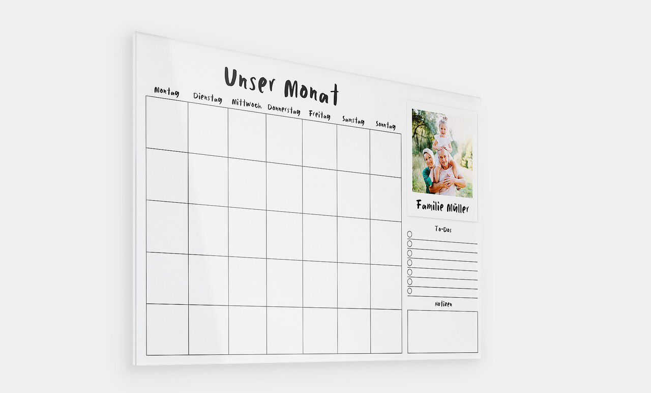 Ein Glas-Monatskalender mit Platz für Fotos und persönlichen Notizen