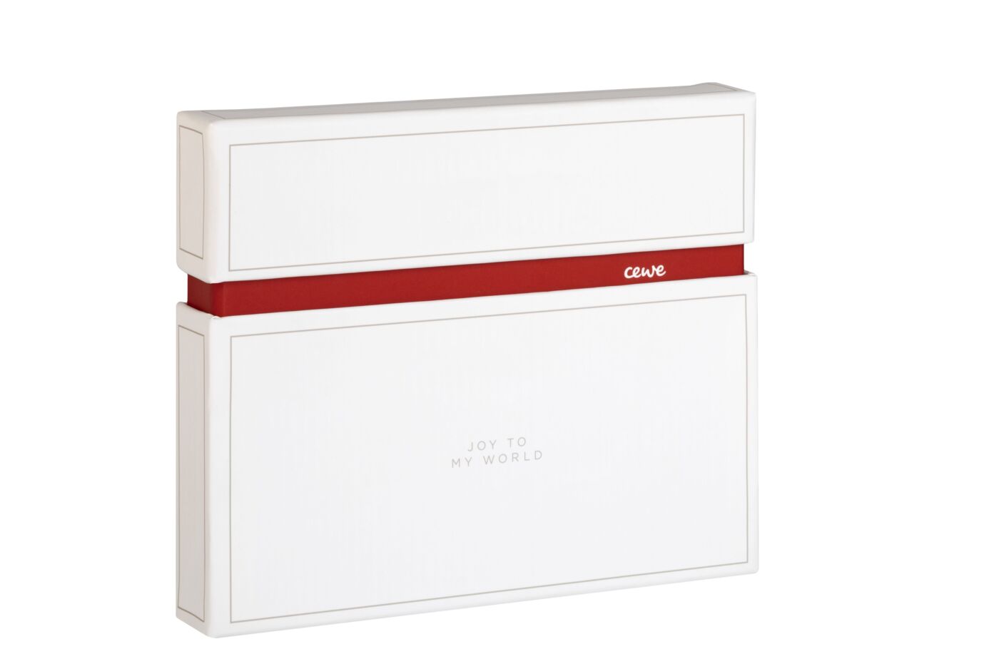 Elegante CEWE Geschenkbox in Weiß mit rotem Band, beschriftet mit 'Joy to my World'