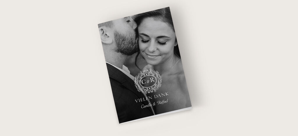 Ein wunderschönes CEWE Fotobuch mit elegantem Cover und liebevollem Design.