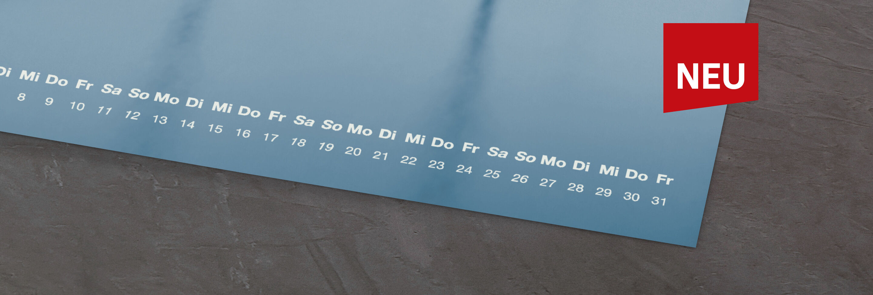 Kalenderblatt mit blauer Fläche und Datumsanzeige für Oktober.