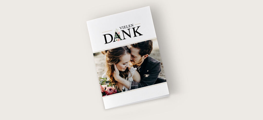 Ein liebevoll gestaltetes Dankeschön-Fotobuch auf einem hellen Hintergrund