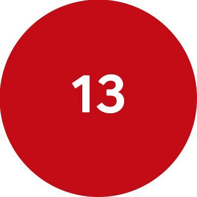 Auf einem roten Kreis steht mit weißer Schrift die Zahl "13".