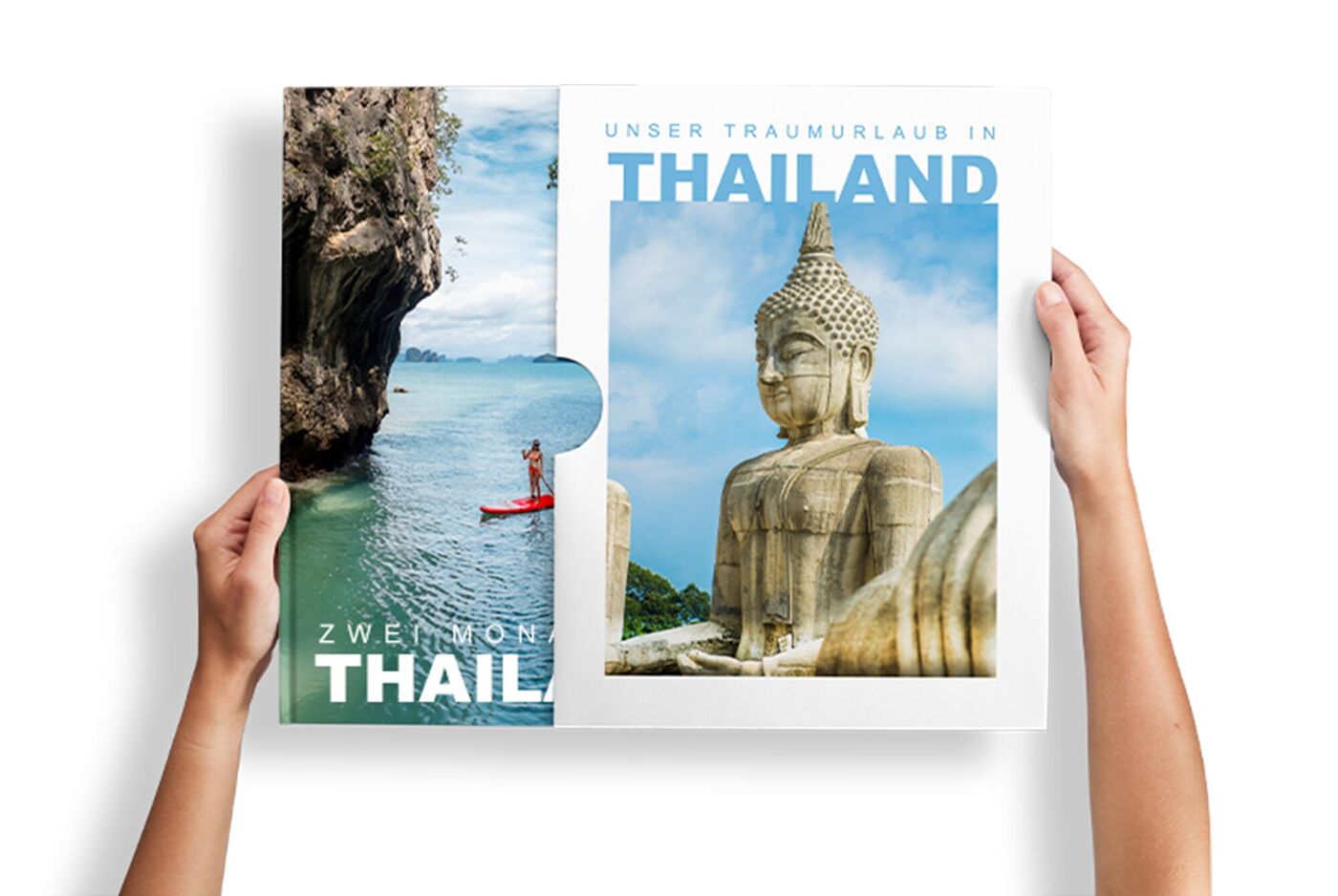 Hände zeigen ein CEWE FOTOBUCH über Thailand mit Buddha-Statue und Meerlandschaft mit Felsen