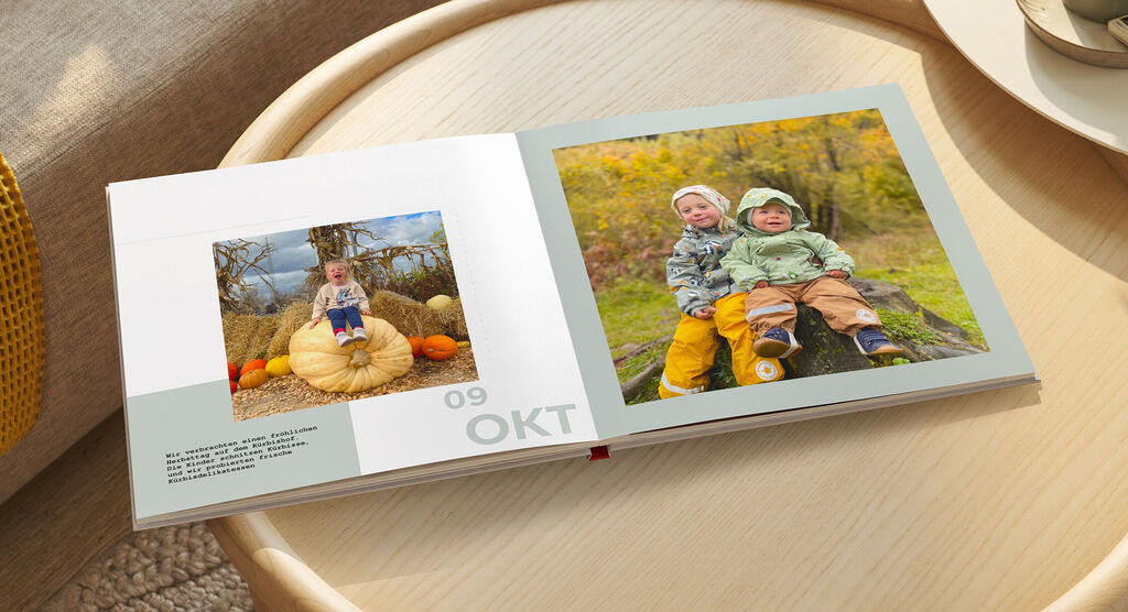 Fotobuch mit bunten Herbstfotos und liebevoll gestalteten Seiten