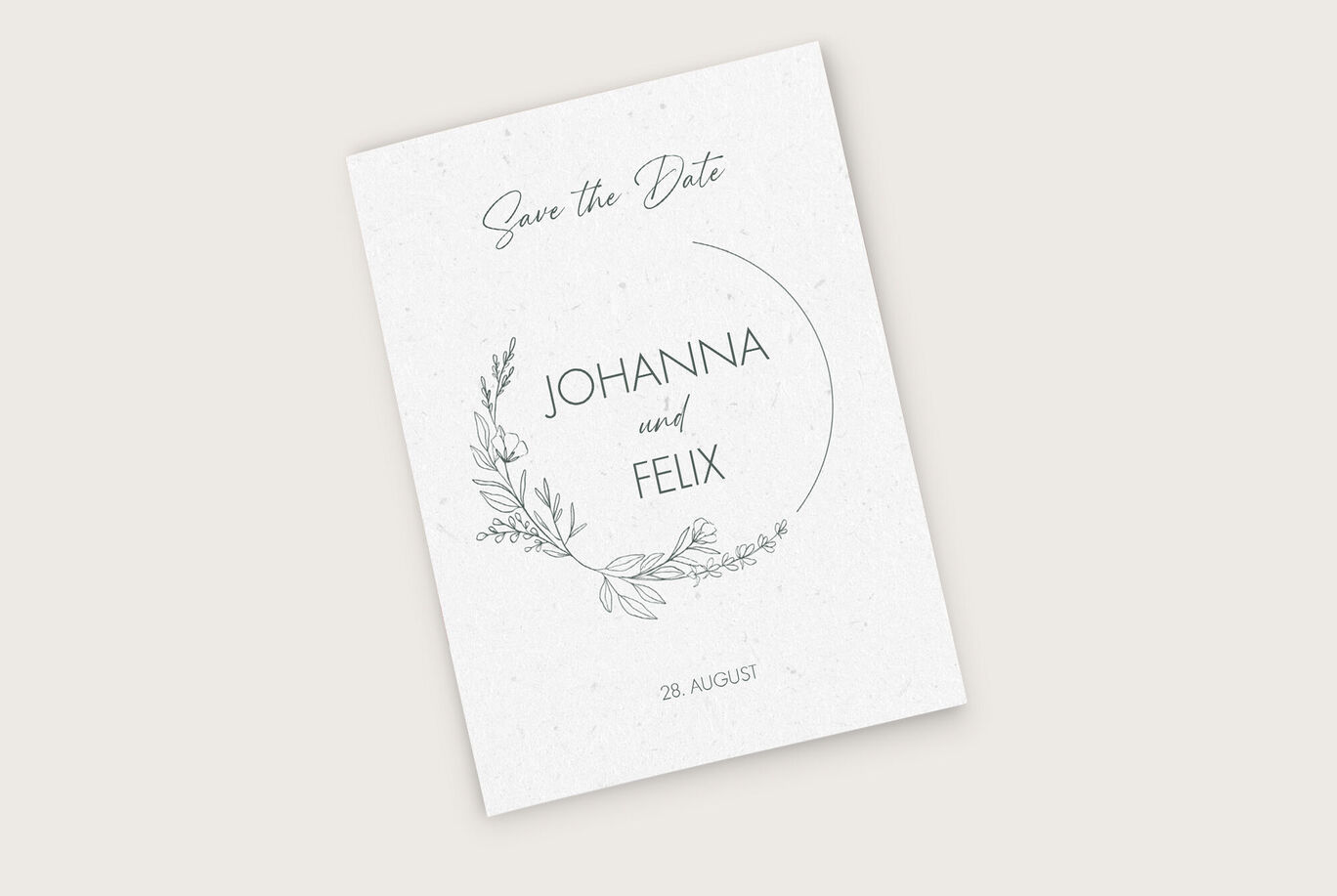 Hochzeitskarte mit floralen Motiven und den Namen Johanna und Felix