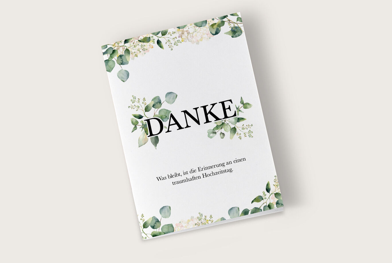 Ein elegantes Dankeskarten-Design mit grünen Blättern.