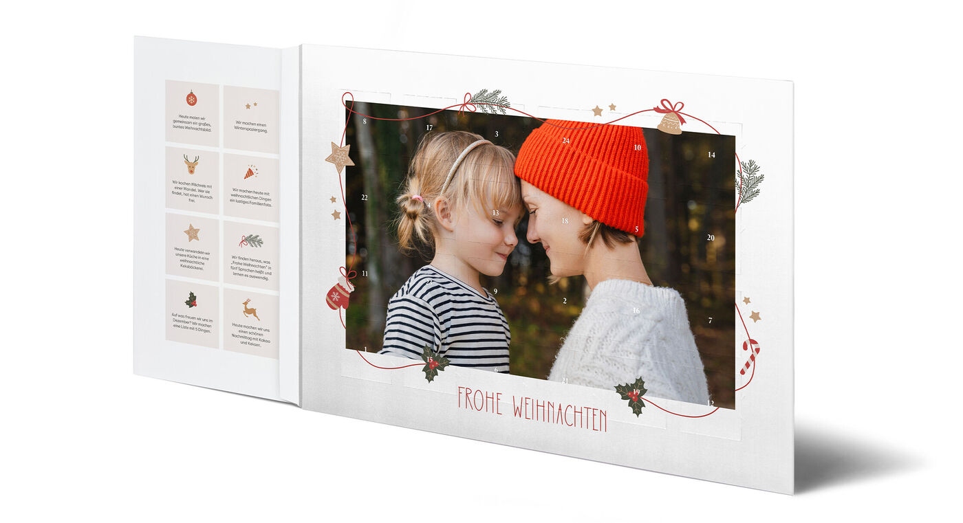 Liebevoll gestalteter Adventskalender mit Weihnachtsmotiven, individuellem Foto und dem Schriftzug "Frohe Weihnachten".