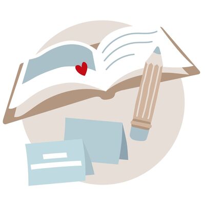 Ein offenes Fotobuch mit Herzmotiv und einem Bleistift neben Karten.