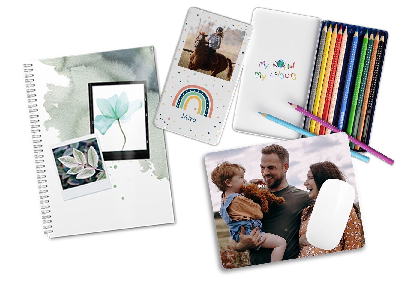 Bunte Schreibutensilien, Notizbuch, ein Farbkreis und Fotos mit einem Kind und Eltern.