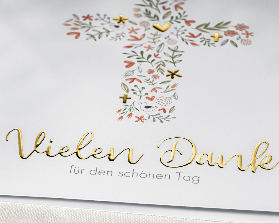 Schöne Dankeskarte mit goldener Schrift und floralen Mustern für einen besonderen Tag