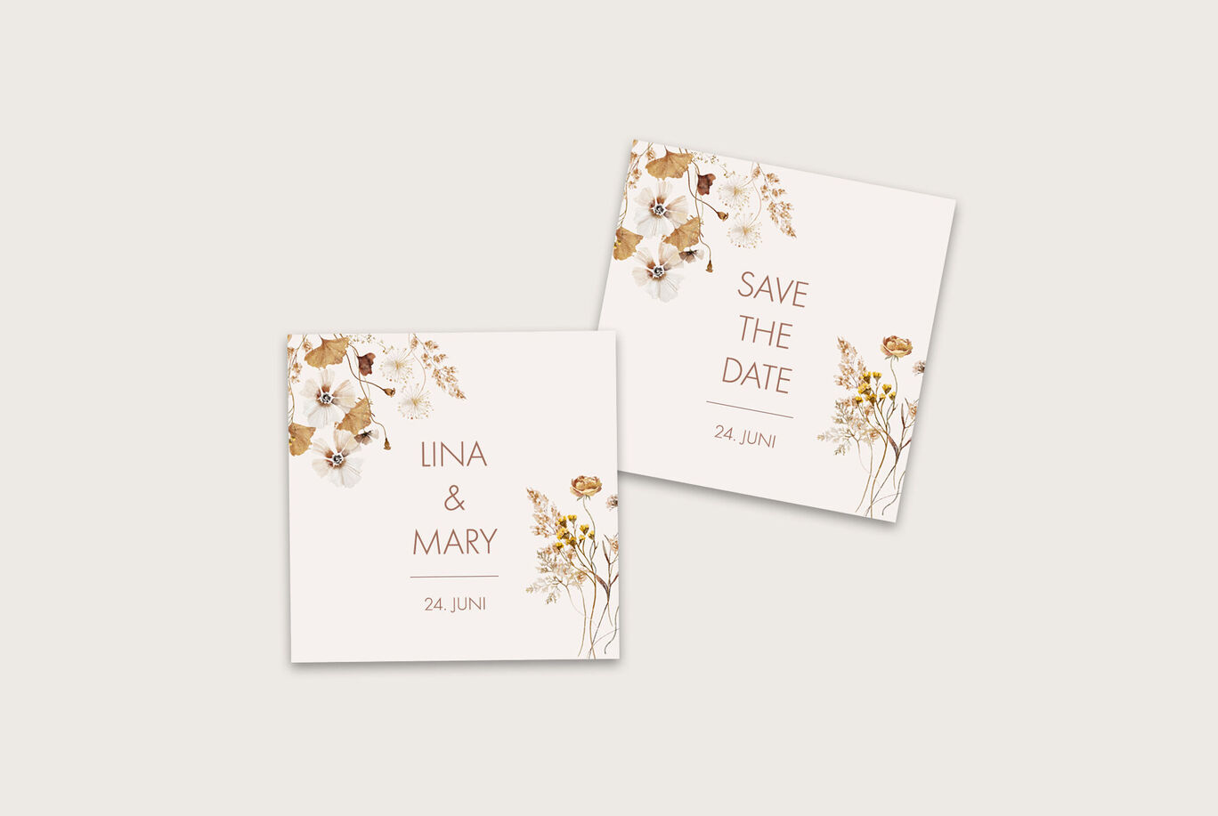 Hübsche Save the Date Karten für eine Hochzeit mit Blumenmotiv und den Namen Lina & Mary