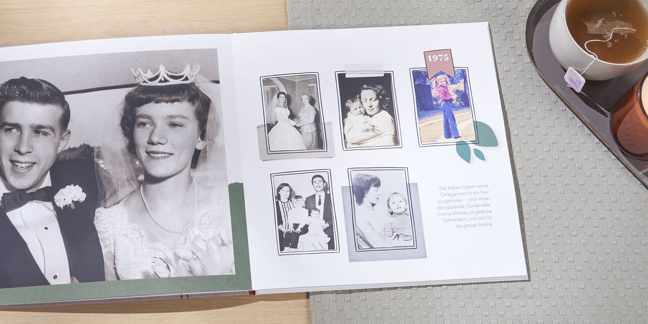 Ein offenes Fotobuch mit Erinnerungen, Fotos zeigen glückliche Momente